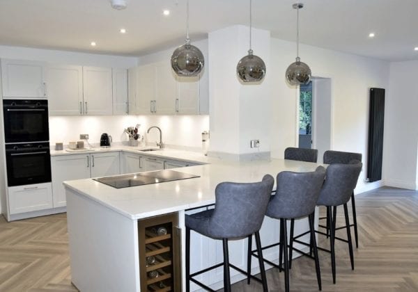 Kitchen utilising kitchen islands to create a functional space